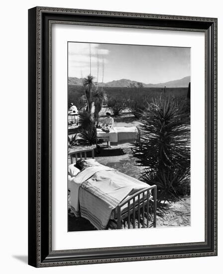 Arthritis Patients Being Tended to by Nurses as They Undergo Sunbathing Treatment at Desert Clinic-Alfred Eisenstaedt-Framed Photographic Print