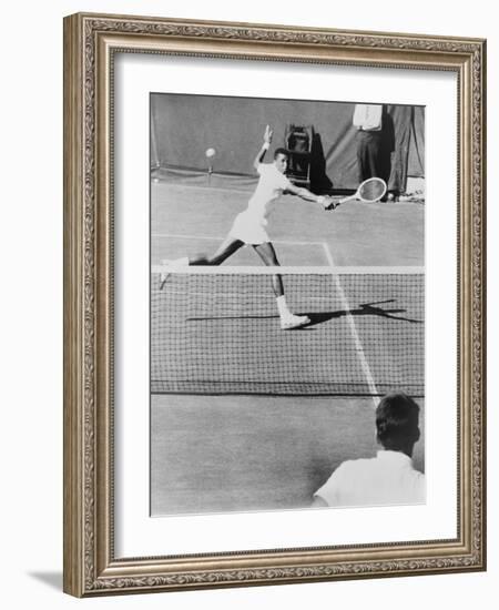 Arthur Ashe, Playing Tennis at Forest Hills, N.Y. in 1964-null-Framed Photo