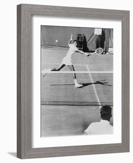 Arthur Ashe, Playing Tennis at Forest Hills, N.Y. in 1964-null-Framed Photo