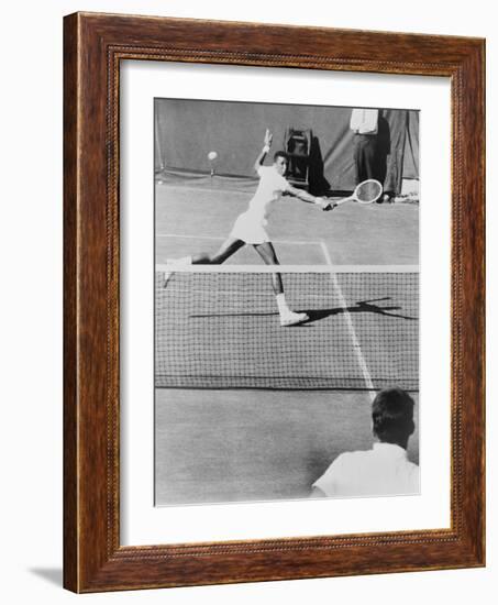 Arthur Ashe, Playing Tennis at Forest Hills, N.Y. in 1964-null-Framed Photo