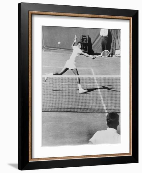 Arthur Ashe, Playing Tennis at Forest Hills, N.Y. in 1964-null-Framed Photo