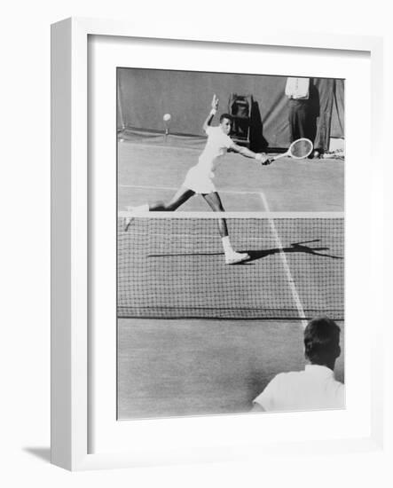 Arthur Ashe, Playing Tennis at Forest Hills, N.Y. in 1964-null-Framed Photo