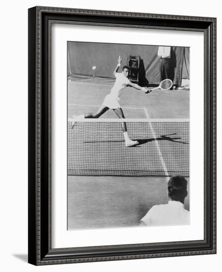 Arthur Ashe, Playing Tennis at Forest Hills, N.Y. in 1964-null-Framed Photo