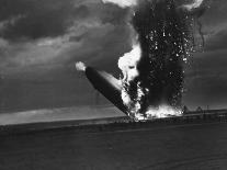 Hindenburg Zeppelin Bursting into Flames While Attempting to Land after 37th Ocean Crossing-Arthur Cofod-Framed Premier Image Canvas