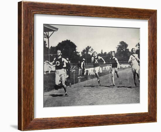 Arthur Duffey, American athlete, running a race, 1902-Edwin Levick-Framed Photographic Print