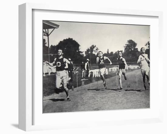 Arthur Duffey, American athlete, running a race, 1902-Edwin Levick-Framed Photographic Print