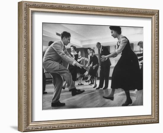 Arthur Murray and His Wife, While Giving a Rock 'N' Roll Demonstration-null-Framed Photographic Print