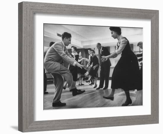 Arthur Murray and His Wife, While Giving a Rock 'N' Roll Demonstration-null-Framed Photographic Print