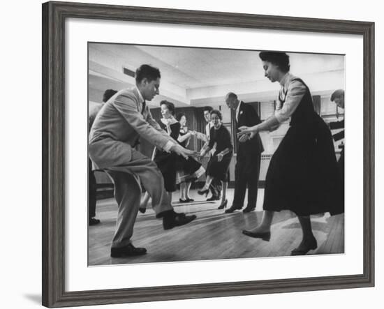 Arthur Murray and His Wife, While Giving a Rock 'N' Roll Demonstration-null-Framed Photographic Print