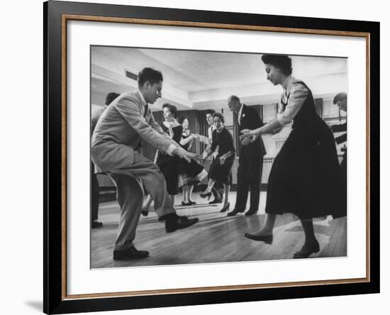 Arthur Murray and His Wife, While Giving a Rock 'N' Roll Demonstration-null-Framed Photographic Print