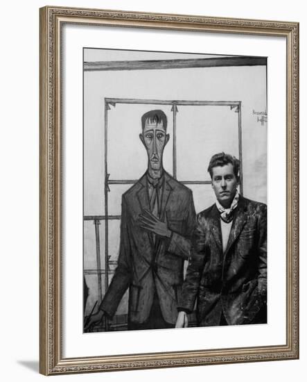 Artist Bernard Buffet Standing Next to a Self Portrait of Himself-Dmitri Kessel-Framed Premium Photographic Print