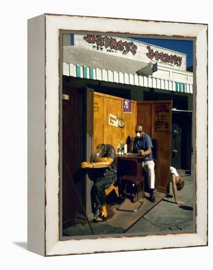 Artist Ed Kienholz Drinking Coffee Inside Section of His Assemblage "The Beanery. "-Ralph Crane-Framed Premier Image Canvas