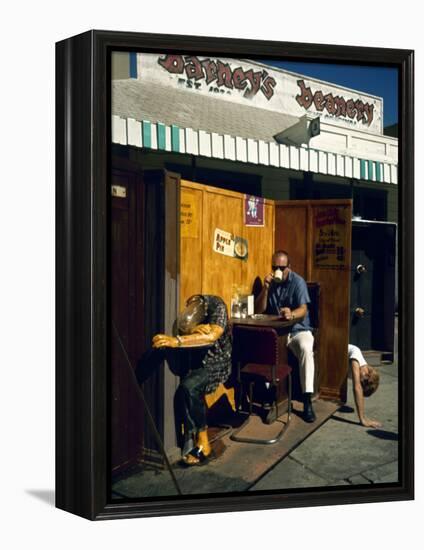 Artist Ed Kienholz Drinking Coffee Inside Section of His Assemblage "The Beanery. "-Ralph Crane-Framed Premier Image Canvas