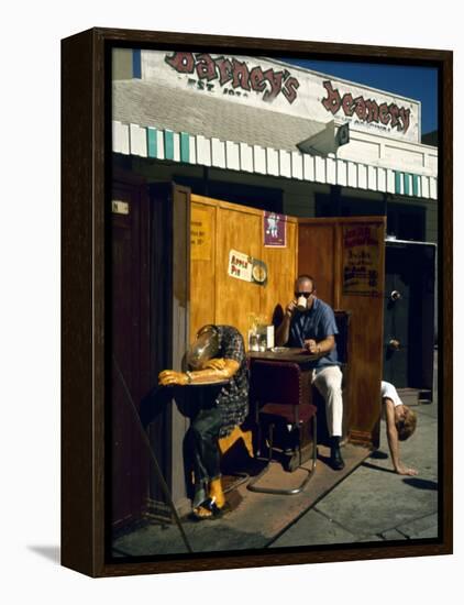 Artist Ed Kienholz Drinking Coffee Inside Section of His Assemblage "The Beanery. "-Ralph Crane-Framed Premier Image Canvas