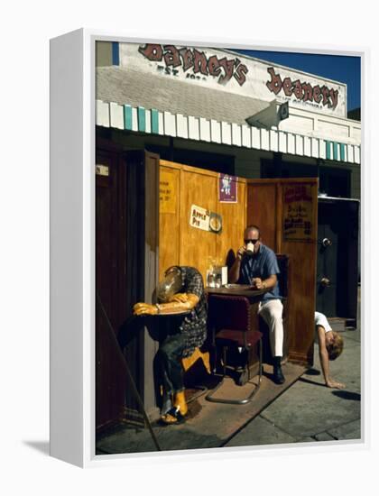 Artist Ed Kienholz Drinking Coffee Inside Section of His Assemblage "The Beanery. "-Ralph Crane-Framed Premier Image Canvas