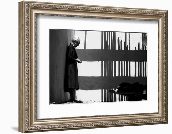 Artist Georgia O'Keeffe Against a Wall Amidst the Shadows of a Fence, Abiquiu, New Mexico, 1966-John Loengard-Framed Photographic Print