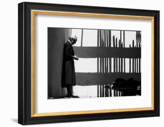 Artist Georgia O'Keeffe Against a Wall Amidst the Shadows of a Fence, Abiquiu, New Mexico, 1966-John Loengard-Framed Photographic Print