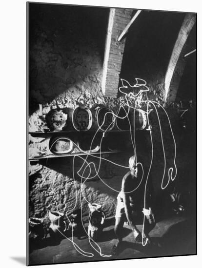 Artist Pablo Picasso "Painting" with Light at Madoura Pottery-Gjon Mili-Mounted Premium Photographic Print