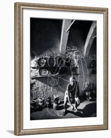 Artist Pablo Picasso "Painting" with Light at the Madoura Pottery-Gjon Mili-Framed Premium Photographic Print