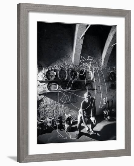 Artist Pablo Picasso "Painting" with Light at the Madoura Pottery-Gjon Mili-Framed Premium Photographic Print