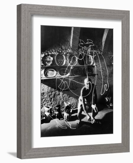 Artist Pablo Picasso "Painting" with Light at the Madoura Pottery-null-Framed Photographic Print