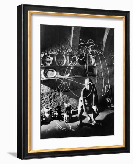 Artist Pablo Picasso "Painting" with Light at the Madoura Pottery-null-Framed Photographic Print