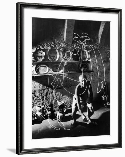 Artist Pablo Picasso "Painting" with Light at the Madoura Pottery-null-Framed Photographic Print