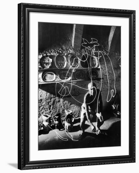 Artist Pablo Picasso "Painting" with Light at the Madoura Pottery-null-Framed Photographic Print