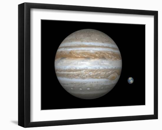 Artist's Concept Comparing the Size of the Gas Giant Jupiter with That of the Earth-Stocktrek Images-Framed Photographic Print