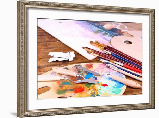 Artistic Equipment: Paint, Brushes and Art Palette on Wooden Table-Yastremska-Framed Art Print