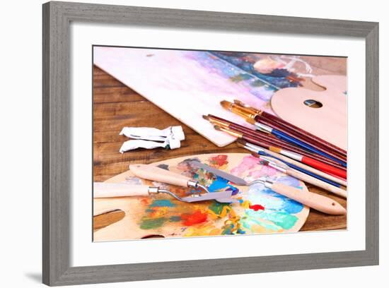 Artistic Equipment: Paint, Brushes and Art Palette on Wooden Table-Yastremska-Framed Art Print