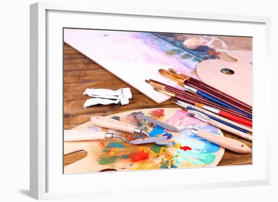Artistic Equipment: Paint, Brushes and Art Palette on Wooden Table-Yastremska-Framed Art Print