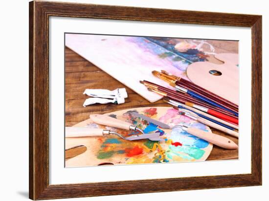 Artistic Equipment: Paint, Brushes and Art Palette on Wooden Table-Yastremska-Framed Art Print