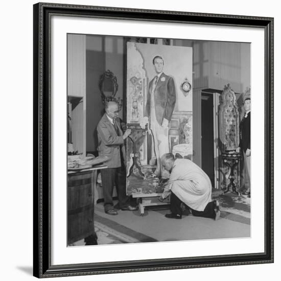 Artists Malvin Albright and Ivan Albright, Working on their Portrait of "Dorian Gray"-null-Framed Premium Photographic Print