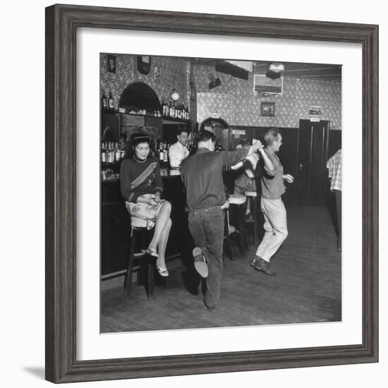 As the Communists Approach, Chinese Hostess Waits While American Seamen Cut Up in the Lear Bar-null-Framed Photographic Print