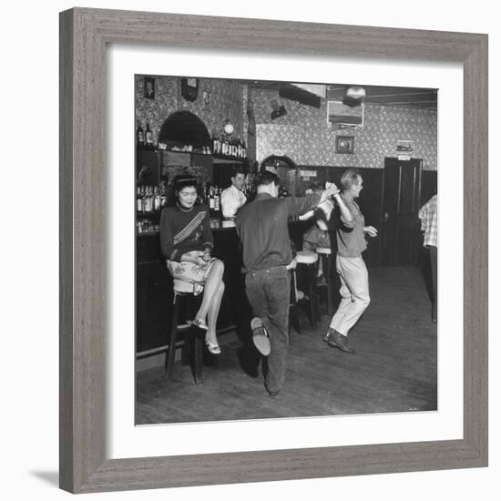 As the Communists Approach, Chinese Hostess Waits While American Seamen Cut Up in the Lear Bar-null-Framed Photographic Print