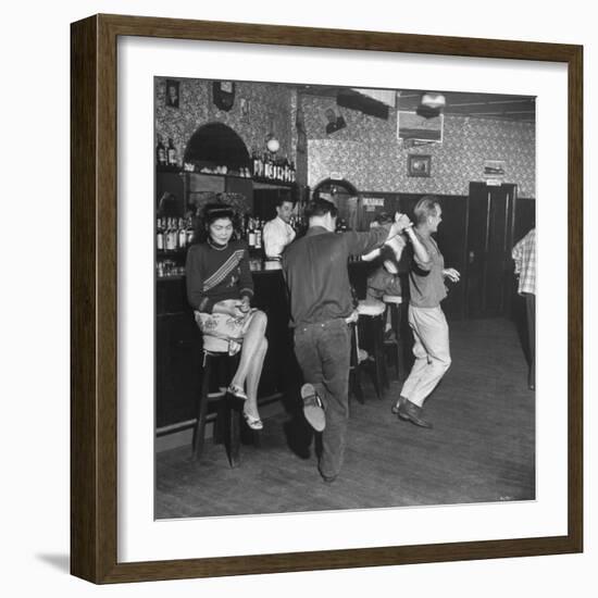 As the Communists Approach, Chinese Hostess Waits While American Seamen Cut Up in the Lear Bar-null-Framed Photographic Print