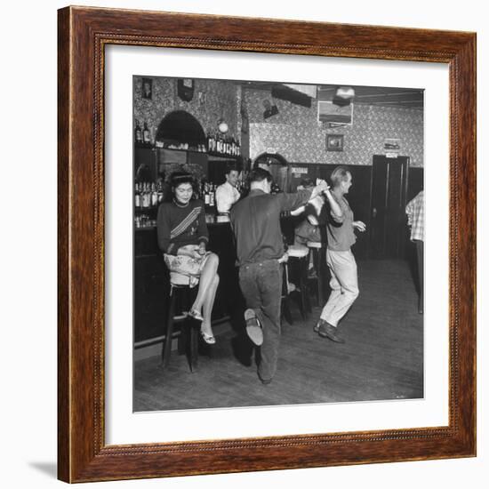 As the Communists Approach, Chinese Hostess Waits While American Seamen Cut Up in the Lear Bar-null-Framed Photographic Print