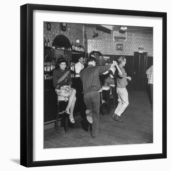 As the Communists Approach, Chinese Hostess Waits While American Seamen Cut Up in the Lear Bar-null-Framed Photographic Print
