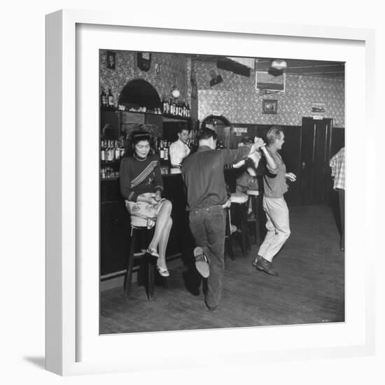 As the Communists Approach, Chinese Hostess Waits While American Seamen Cut Up in the Lear Bar-null-Framed Photographic Print