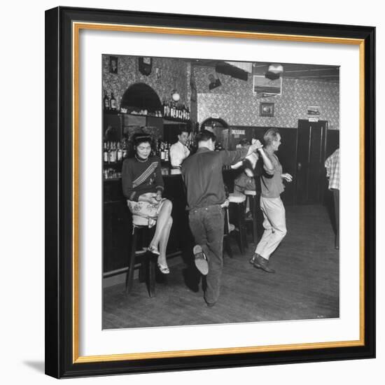 As the Communists Approach, Chinese Hostess Waits While American Seamen Cut Up in the Lear Bar-null-Framed Photographic Print