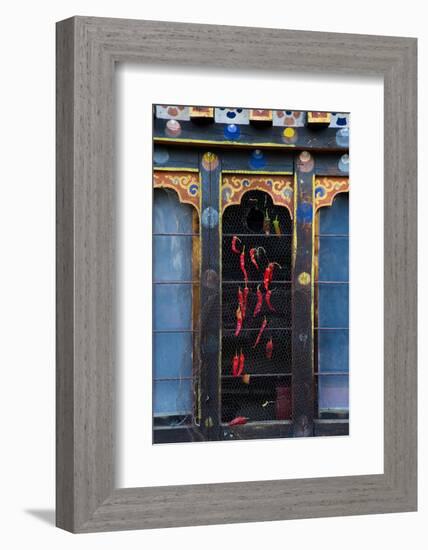 Asia, Bhutan, Haa Valley, Chili Peppers. Chili Peppers Drying in Windows-Ellen Goff-Framed Photographic Print