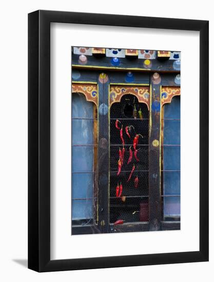 Asia, Bhutan, Haa Valley, Chili Peppers. Chili Peppers Drying in Windows-Ellen Goff-Framed Photographic Print