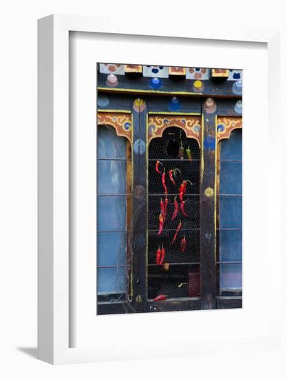 Asia, Bhutan, Haa Valley, Chili Peppers. Chili Peppers Drying in Windows-Ellen Goff-Framed Photographic Print