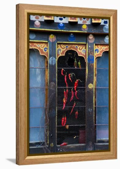 Asia, Bhutan, Haa Valley, Chili Peppers. Chili Peppers Drying in Windows-Ellen Goff-Framed Premier Image Canvas