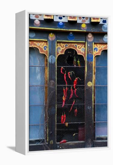 Asia, Bhutan, Haa Valley, Chili Peppers. Chili Peppers Drying in Windows-Ellen Goff-Framed Premier Image Canvas