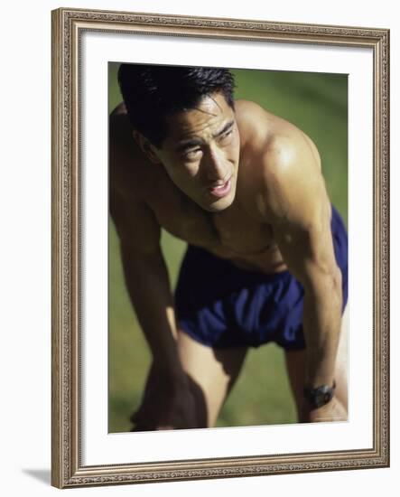 Asian Man Pausing During Workout-null-Framed Photographic Print