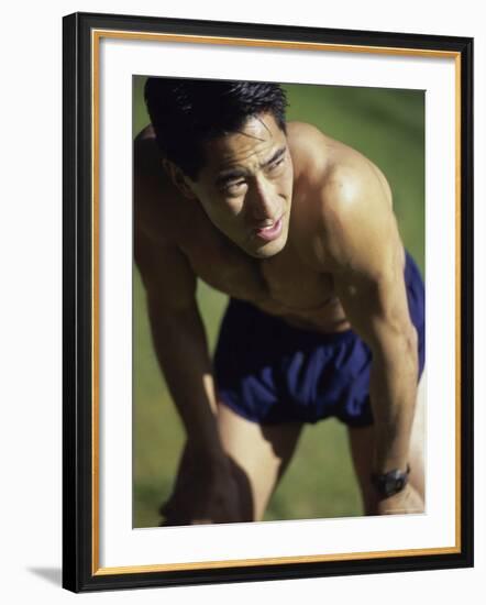 Asian Man Pausing During Workout-null-Framed Photographic Print