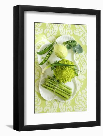 Assorted Green Vegetables on Porcelain Plate-Ulrike Koeb-Framed Photographic Print