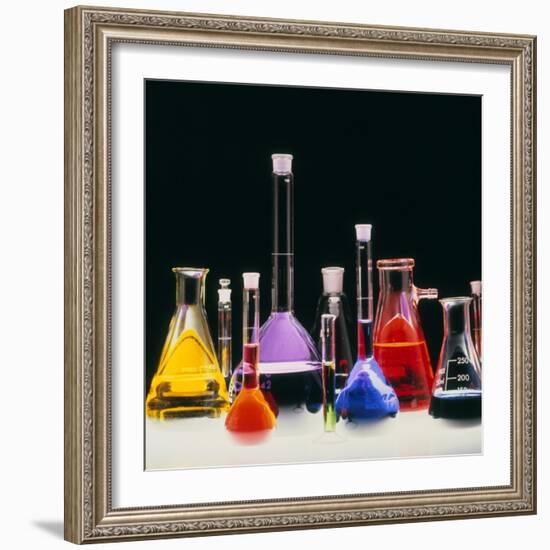 Assortment of Laboratory Flasks Holding Solutions-Tek Image-Framed Premium Photographic Print